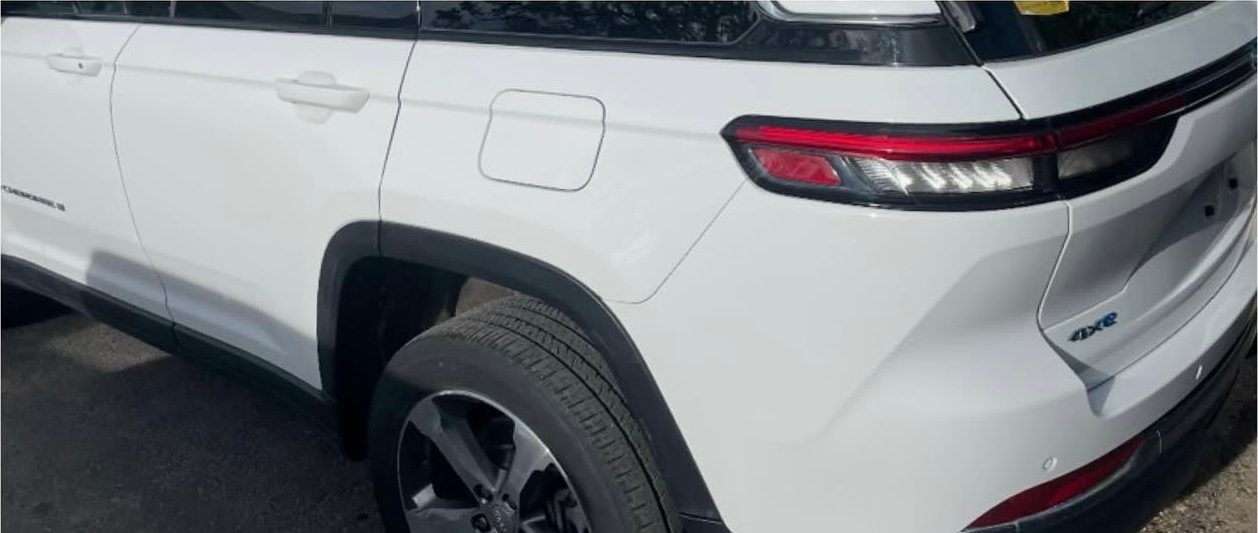 The same Jeep Grand Cherokee with the panel repaired and the paint matched.